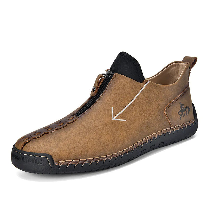 Men's brown leather martin boots with front zipper and hand-stitched detailing