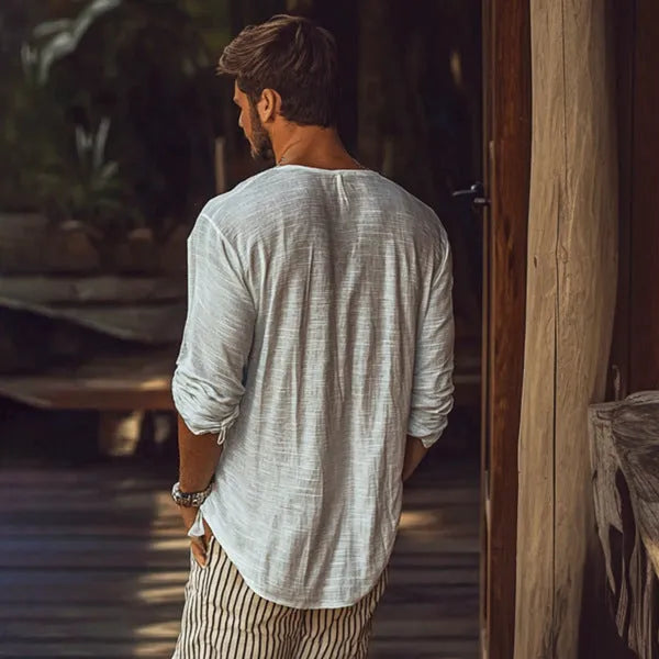 Beige V-neck long-sleeved slim fit t-shirt made from hemp blend fabric.