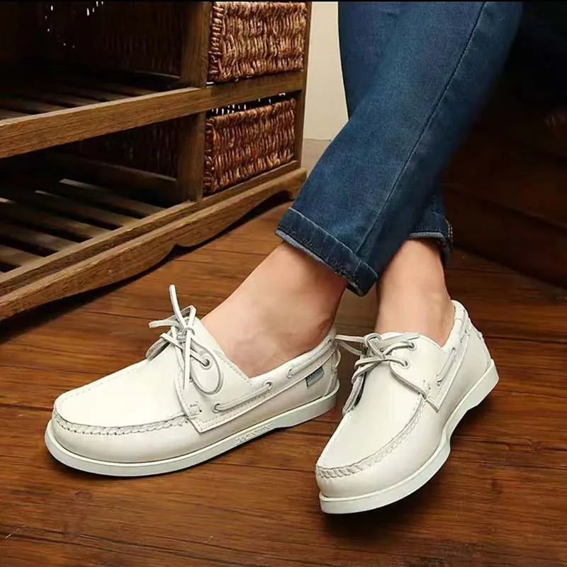 Men's black casual Oxford-style shoes with artificial PU leather upper and flat heel on a white background.