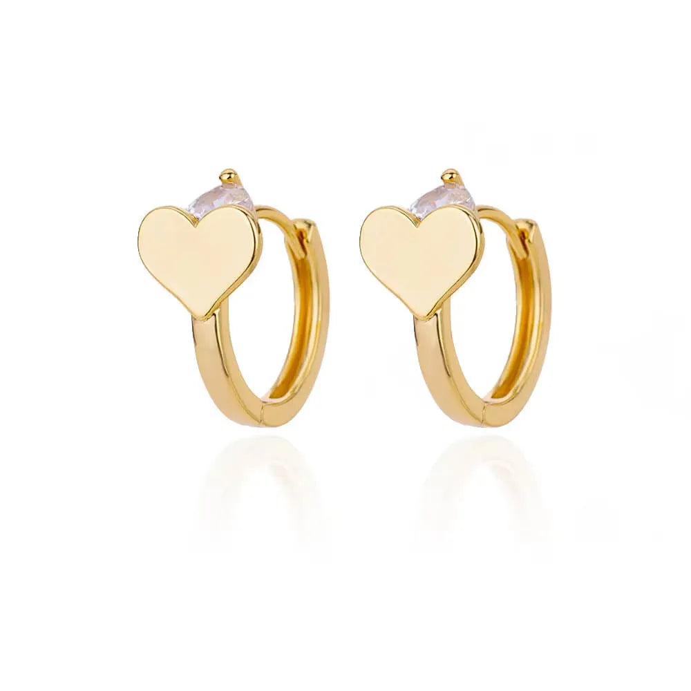 A pair of heart-shaped stainless steel stud earrings with zircon accents and a clip fastening.