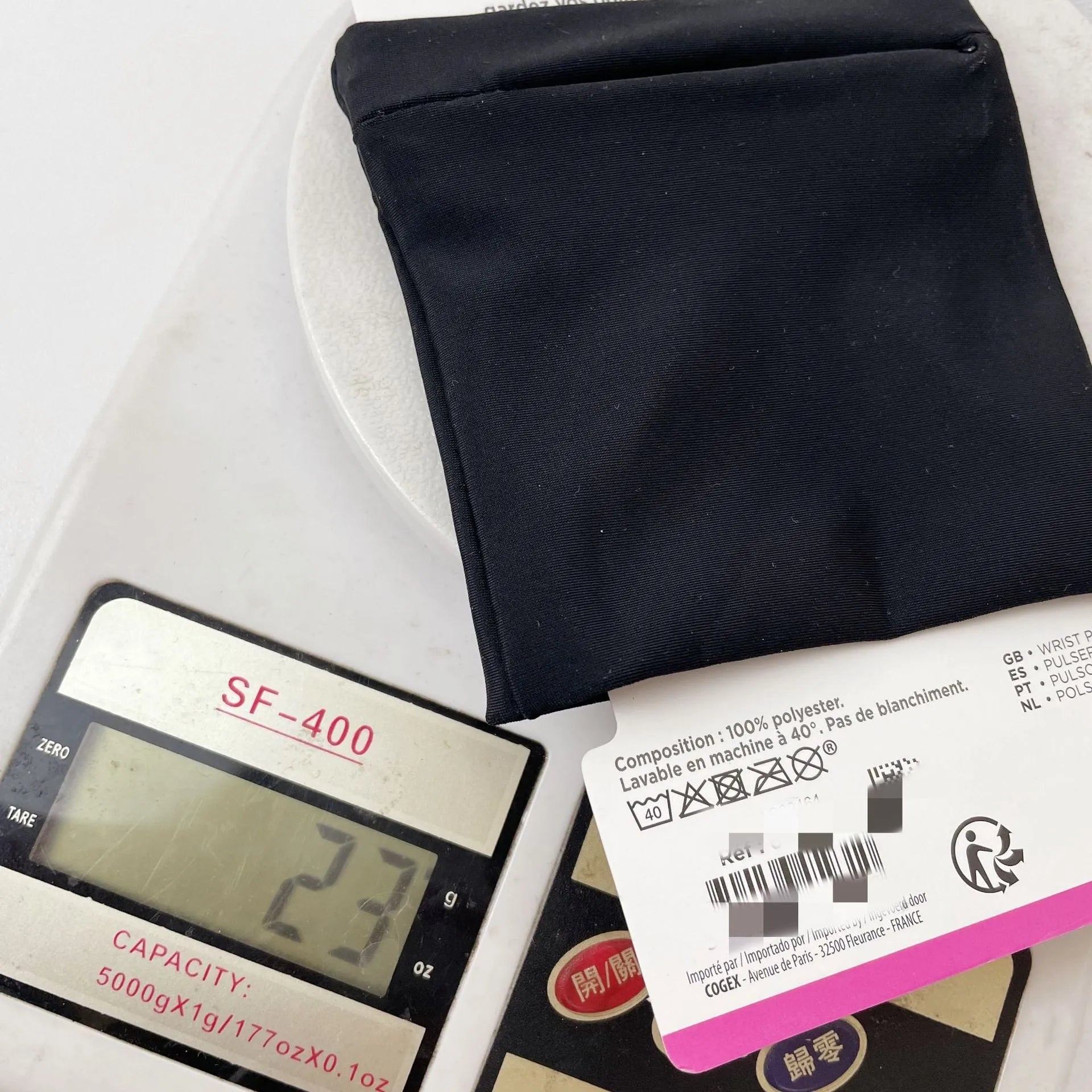 Wrist bag armband sleeve for mobile phone measuring 10 by 10.5 centimetres.