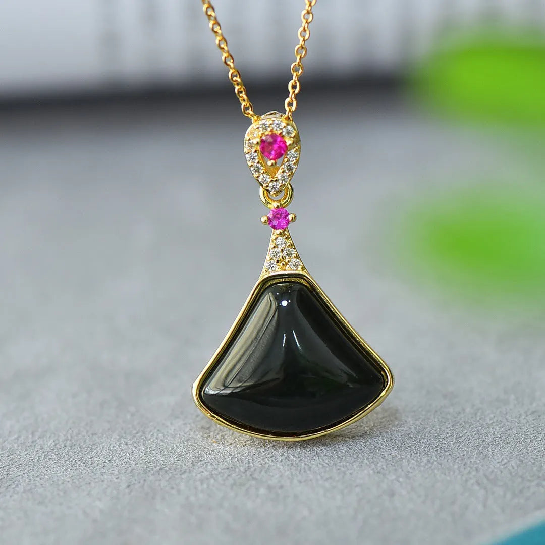Flat grey Hetian Jade pendant with copper inlay and blue jadeware detail on a silver chain.
