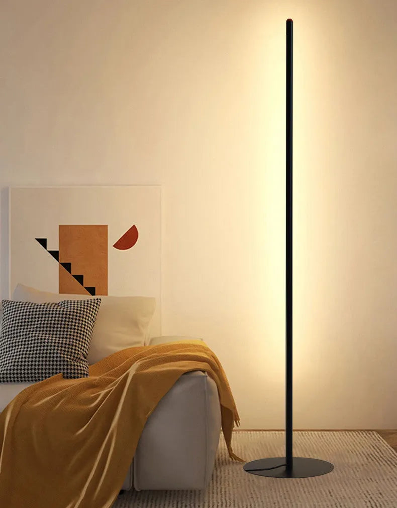 Simple vertical aluminium alloy floor lamp in modern design showing three size options.