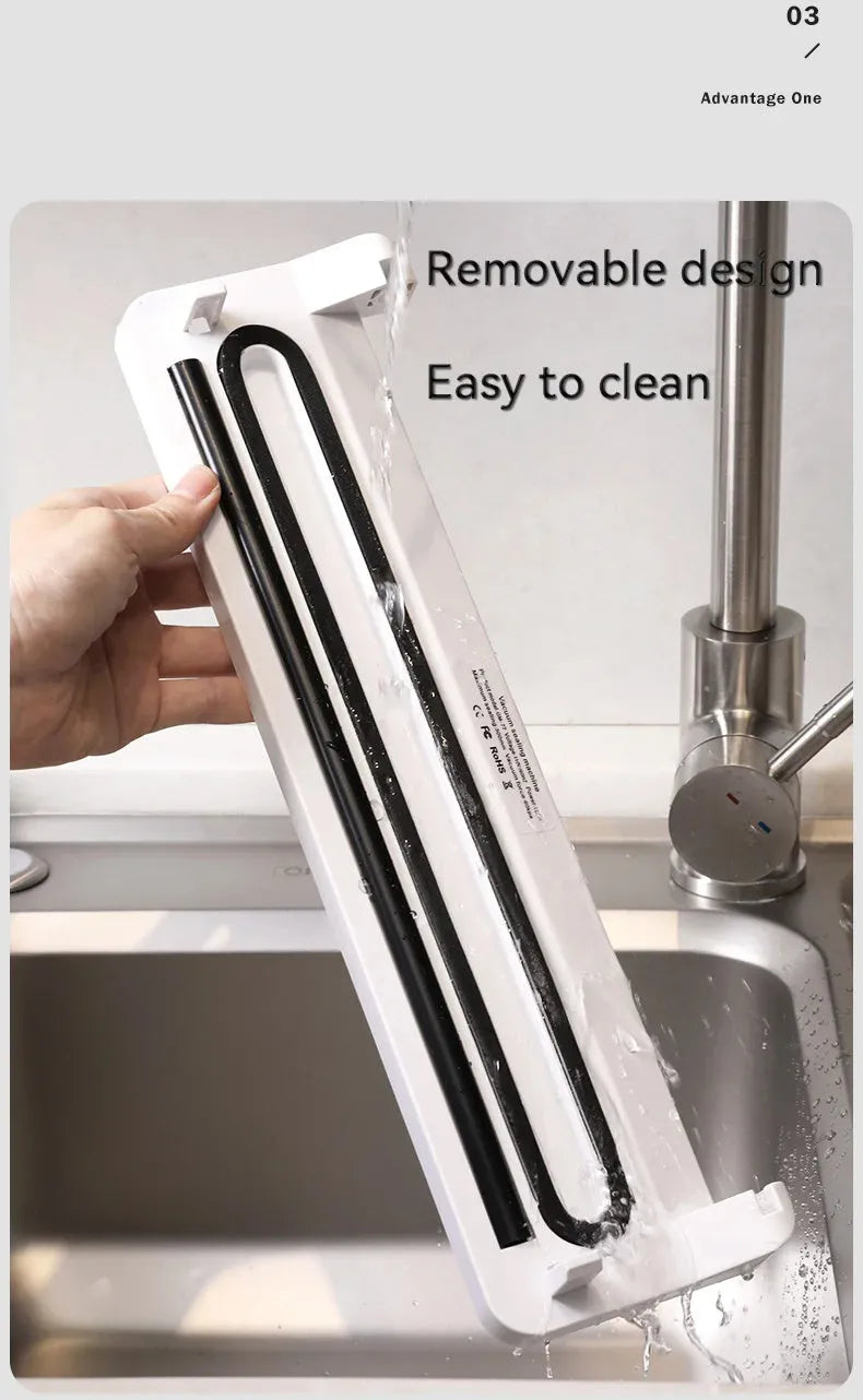 Black automatic vacuum sealer machine for household food preservation and item storage protection