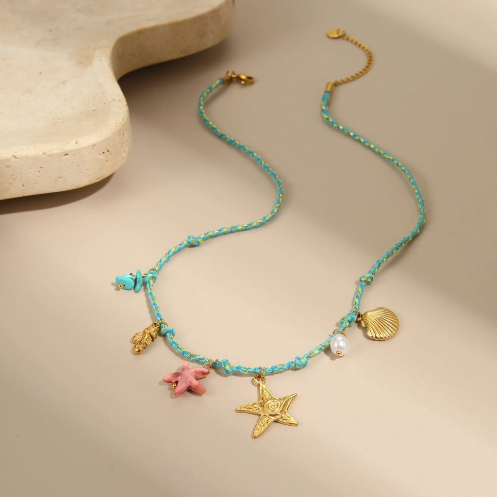 Handmade braided rope titanium steel necklace and bracelet set with 18K gold electroplated heart, star, and geometric pendants.