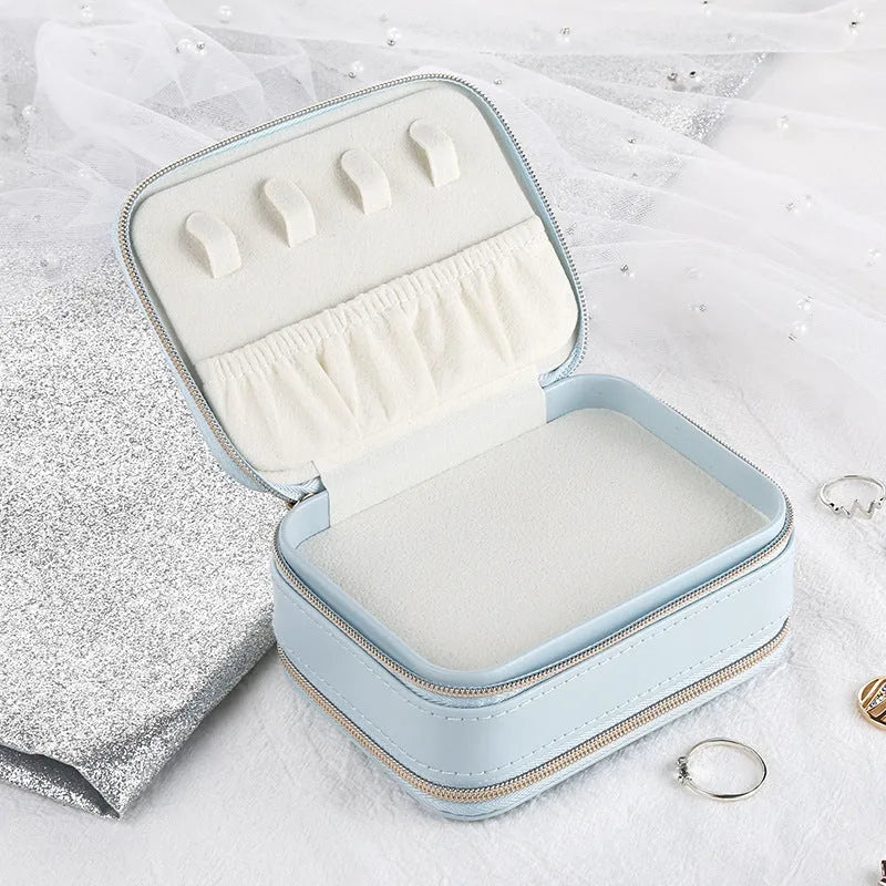 Simple zipper jewellery box in pink made from soft PU material with compact 11.5x8.5x5cm size