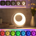 Creative Touch small RGB colour-changing desk lamp with remote control on wooden surface