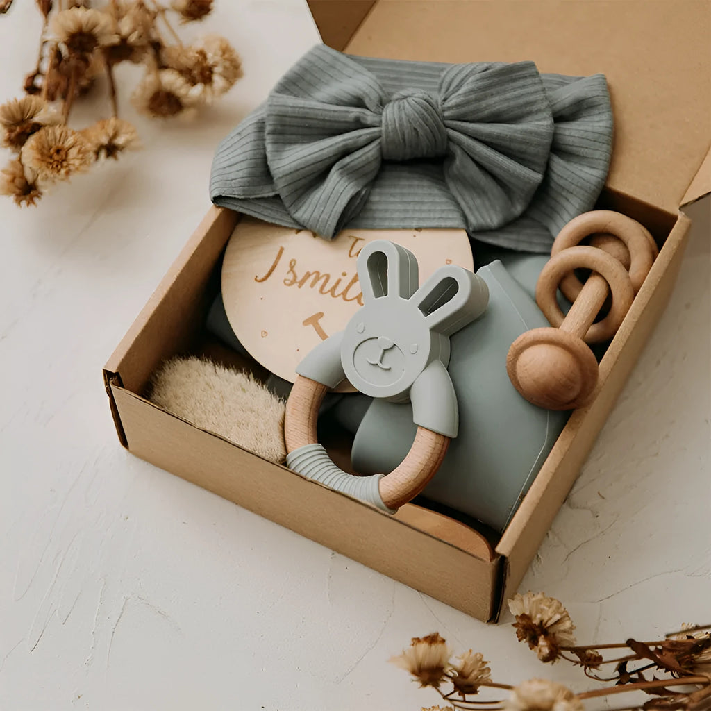 Newborn baby shower toy set of six bath toys in wood and chemical fibre, available in blue, brown, or peach