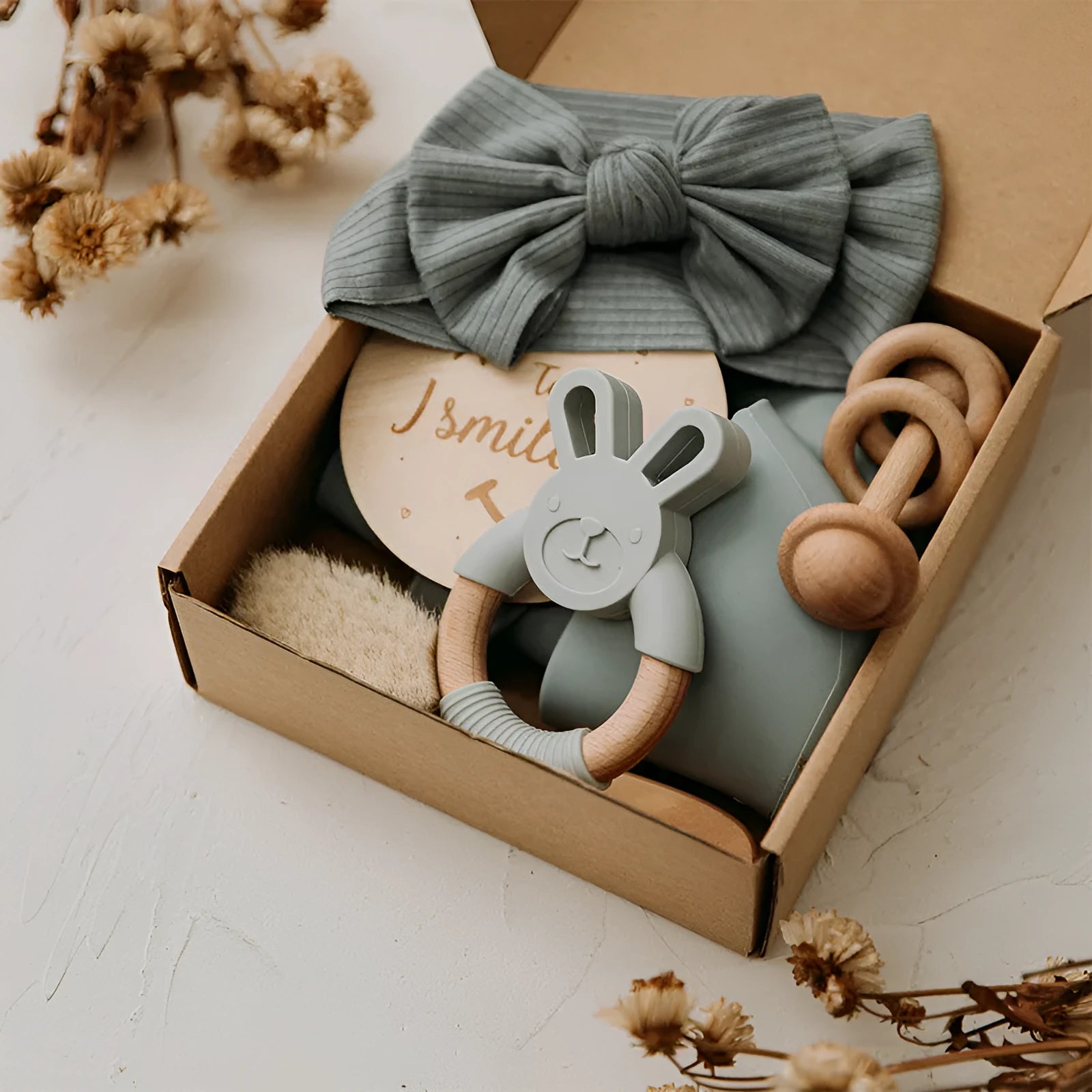 Newborn baby shower toy set of six bath toys in wood and chemical fibre, available in blue, brown, or peach