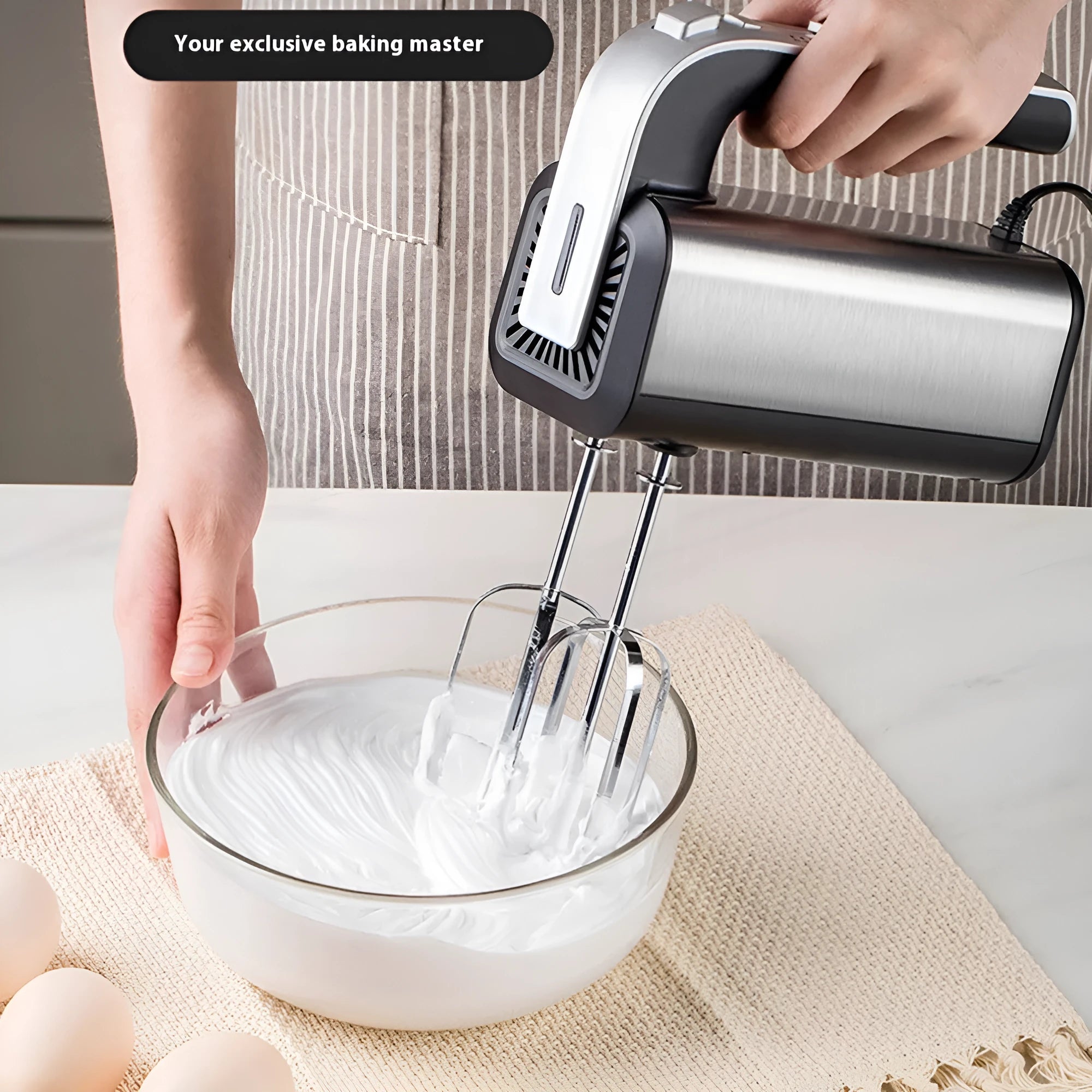 Silver handheld electric whisk with 5-speed control dial