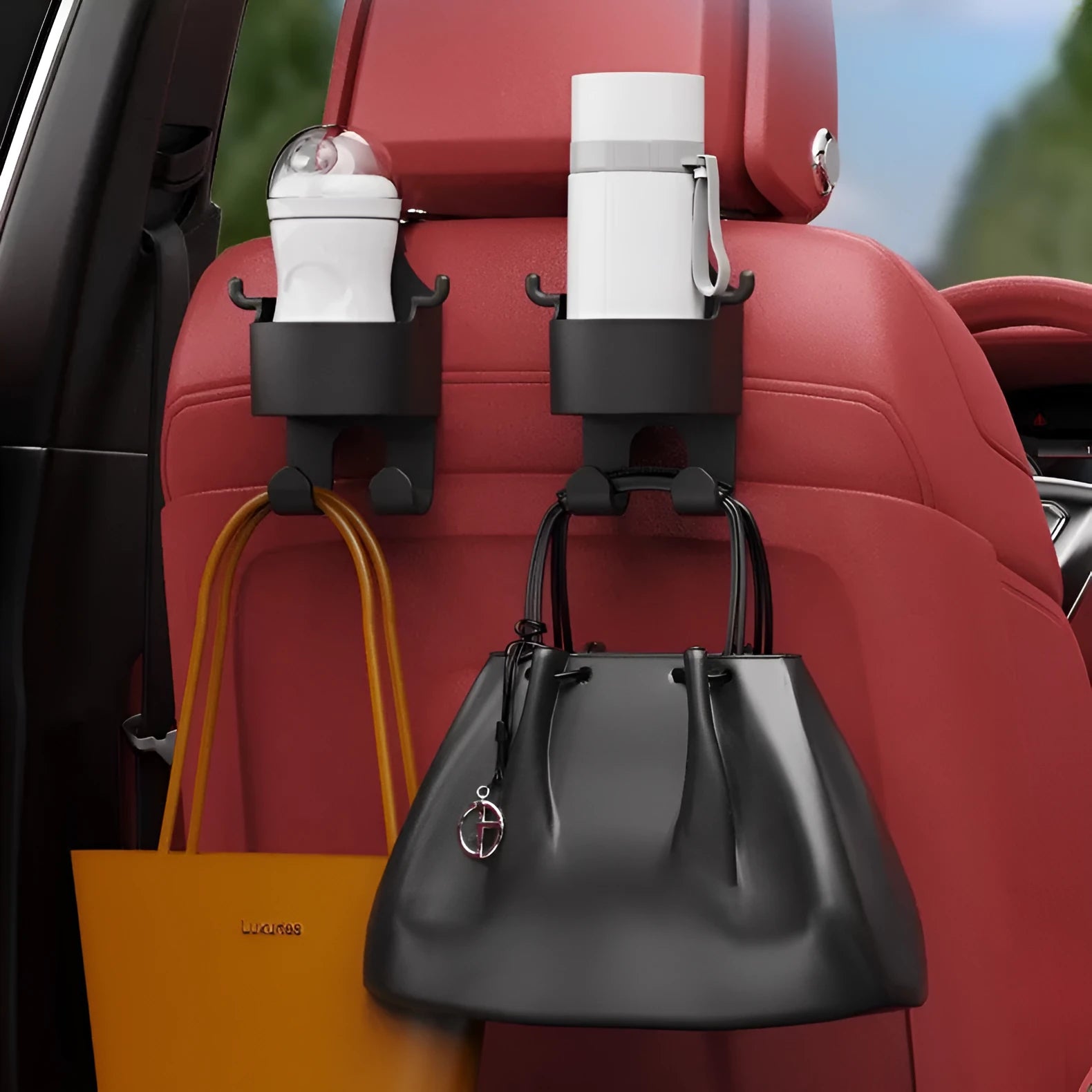 Black plastic car seat back hook with integrated cup holder for vehicle organisation