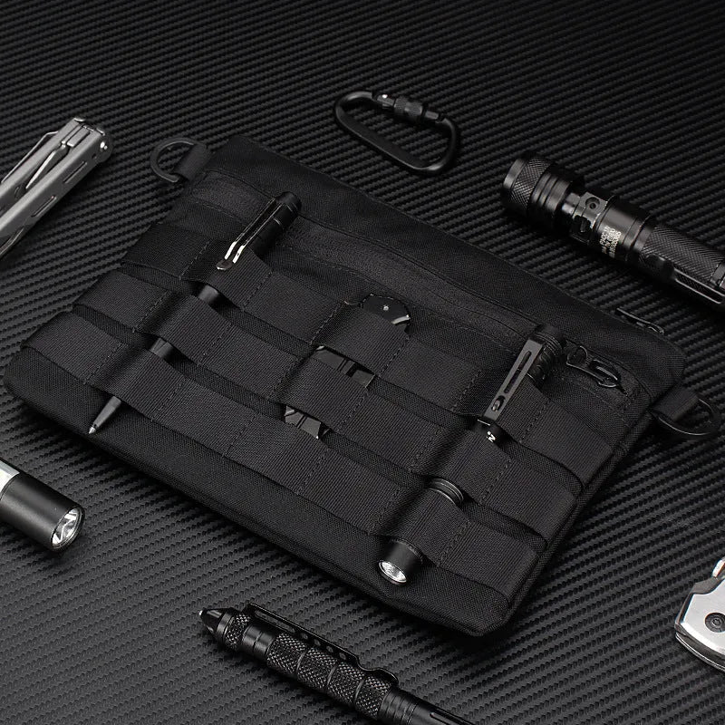 Black Oxford cloth tactical outdoor pouch measuring 18 by 3.5 centimetres