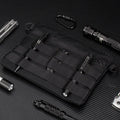 Black Oxford cloth tactical outdoor pouch measuring 18 by 3.5 centimetres