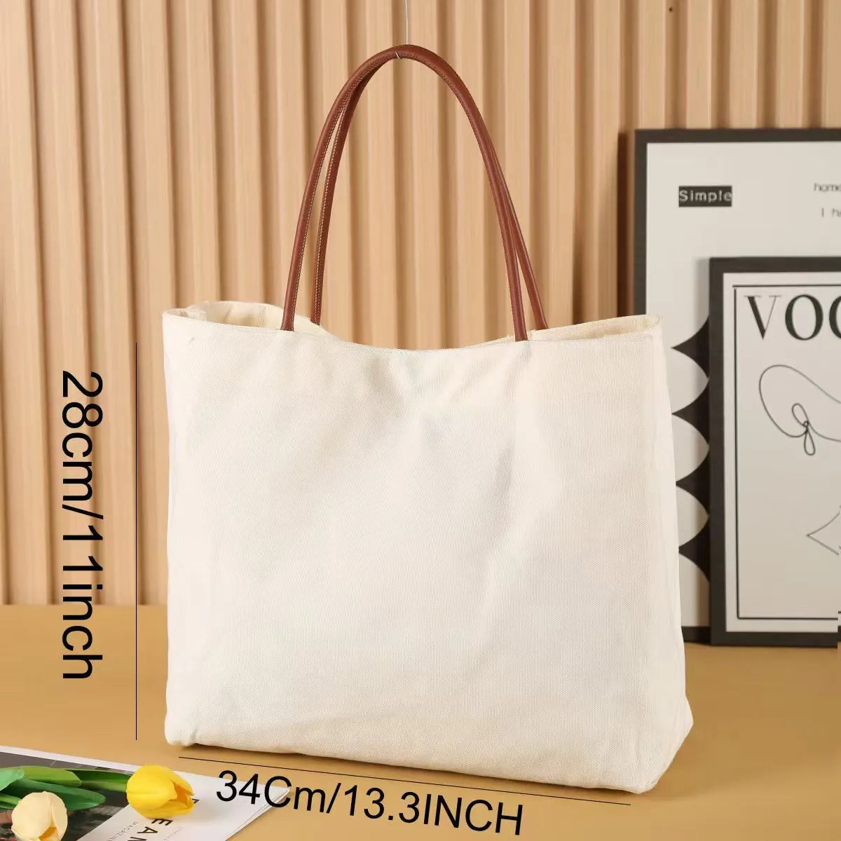 Large natural cotton canvas tote bag with wide straps, shown in beige white colour.
