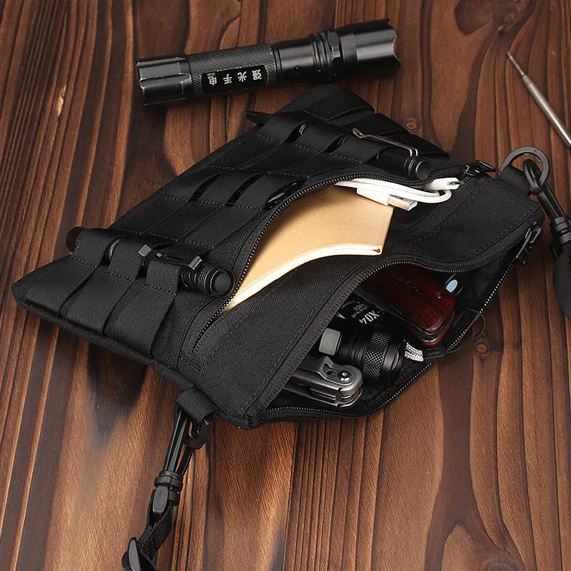 Black Oxford cloth tactical outdoor pouch measuring 18 by 3.5 centimetres