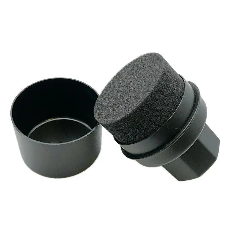 Hand-held black car tyre polishing sponge brush with lid, dimensions 85mm by 120mm, for applying tyre dressings.