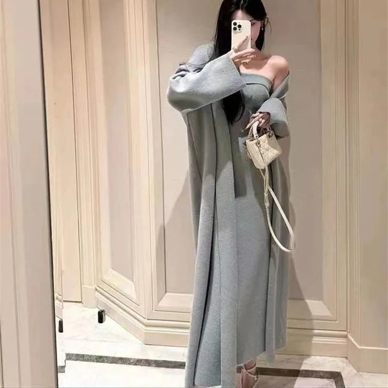 Women's grey knitted cardigan dress and coat suit set with flocking pattern detail.