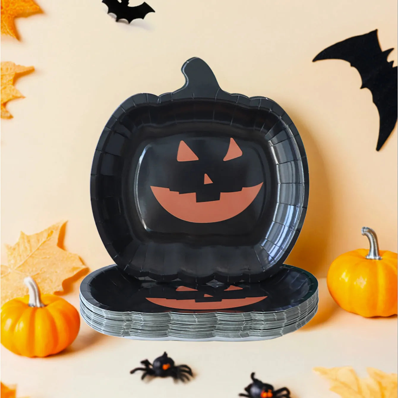 Black pumpkin design disposable paper plates in 9-inch size for Halloween parties