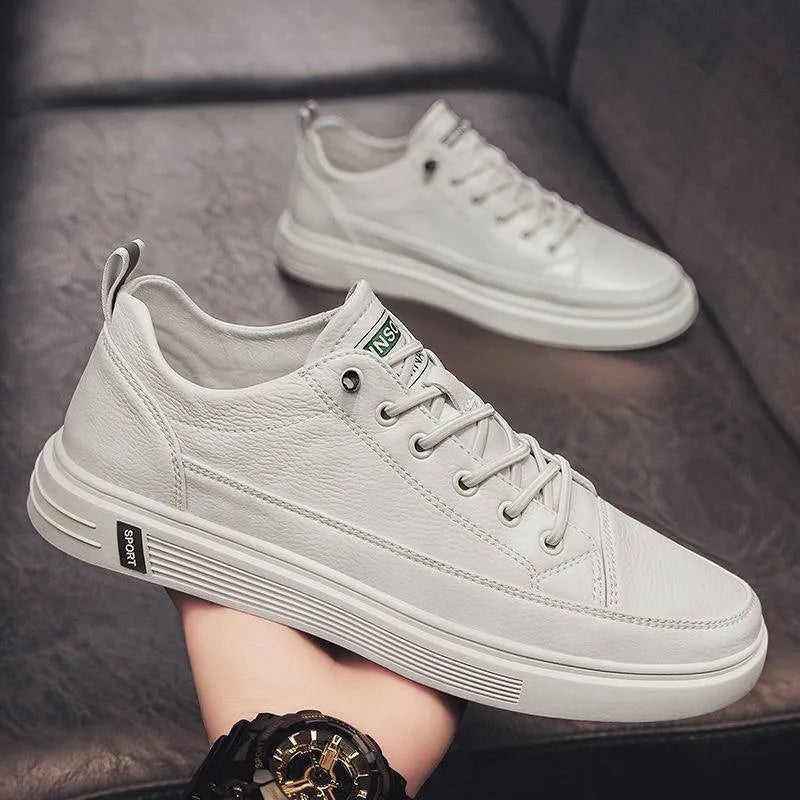 Men's white casual PU shoes with round toe, flat bottom, and low heel on a plain background.