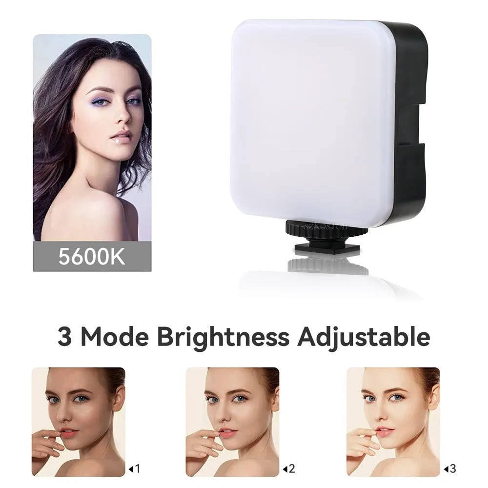 Mini square outdoor camera flash on a small tripod with a rotatable head