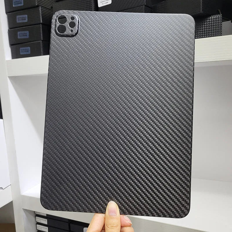 Carbon fibre hard case for Apple iPad Pro 11 with embossed plaid pattern showing three surface finish options