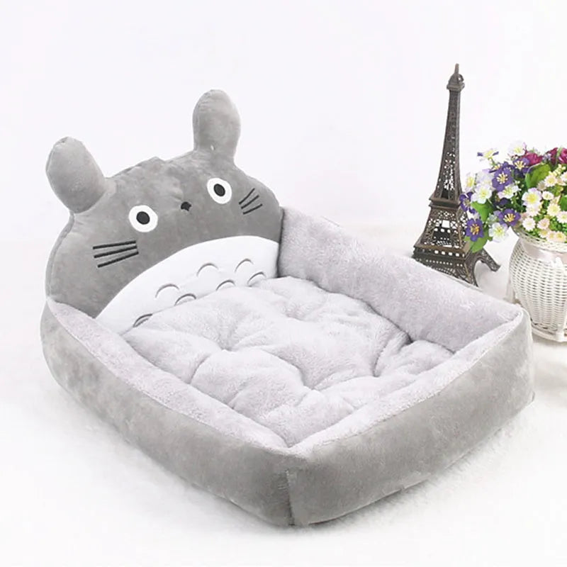 Cartoon-style pet bed for small dogs and cats with a washable cover in a choice of colours.