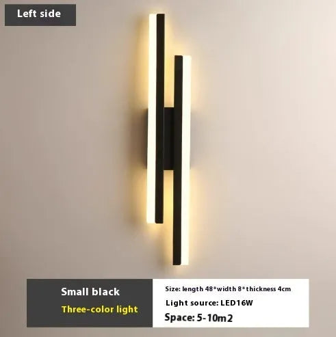 Modern Scandinavian minimalist LED wall light with acrylic shade in black or gold finish.