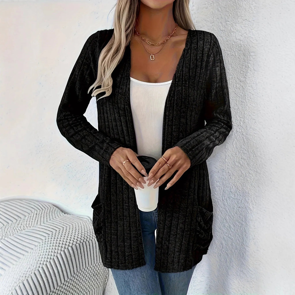 Solid colour loose fit long sleeve cardigan with front pocket in grey or black.