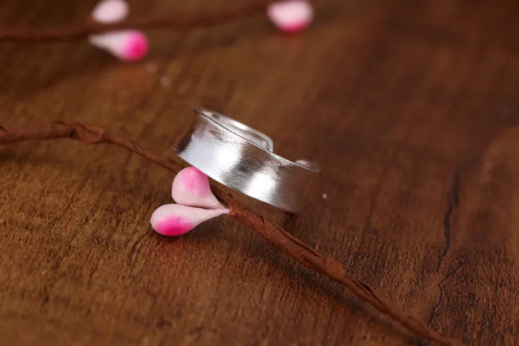 Geometric sterling silver ring with adjustable opening and frosted electroplated finish