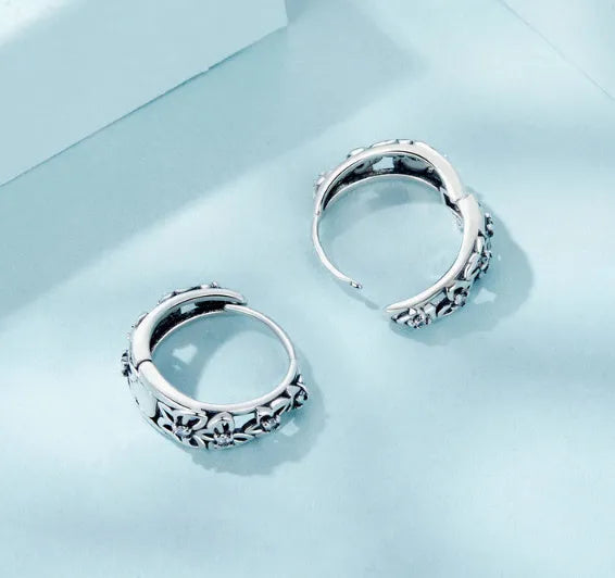 S925 sterling silver retro hollow butterfly drop earrings with zircon stones on an 11mm hoop.