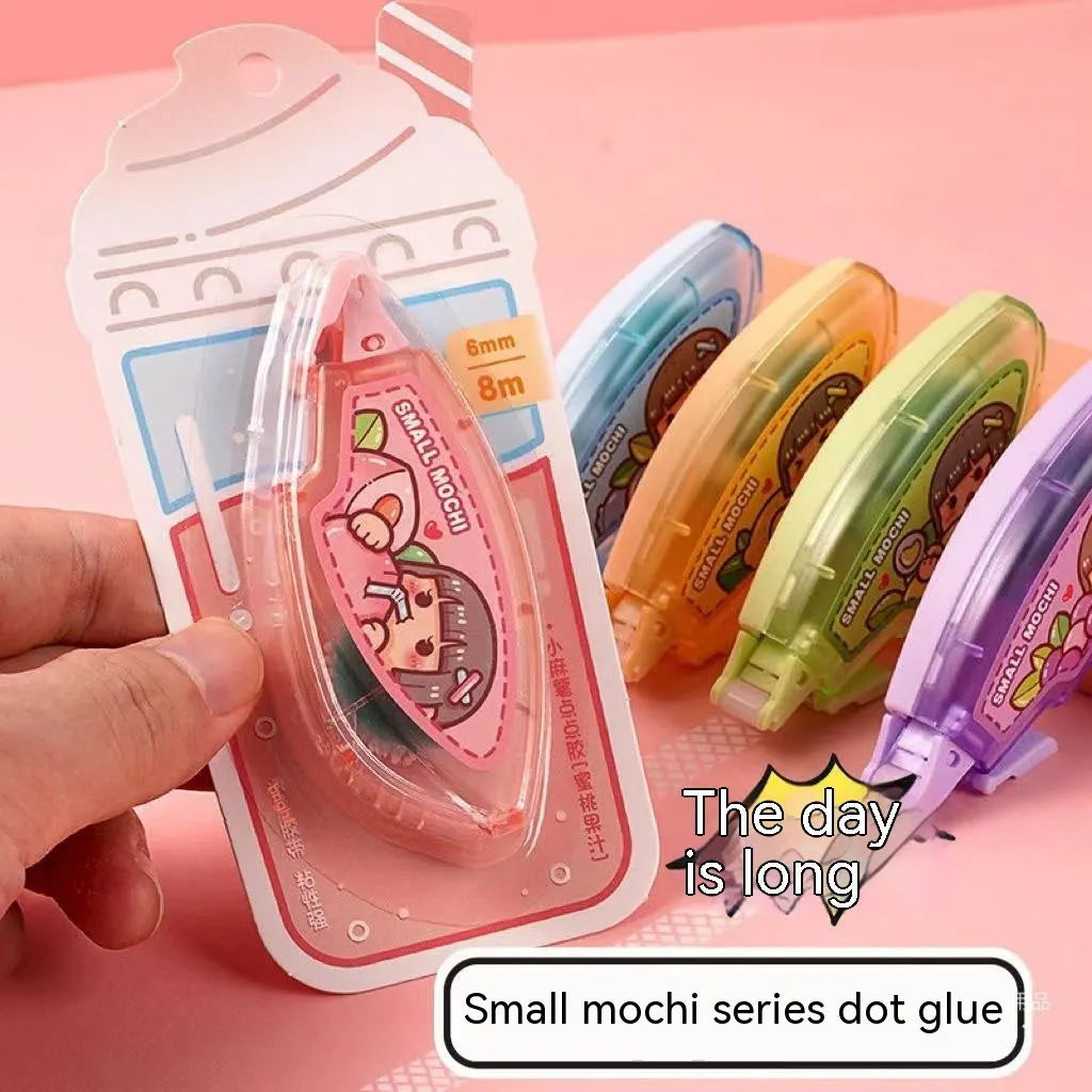 5ml plastic tube of peach juice coloured dotting glue adhesive for crafts and stationery on card packaging.