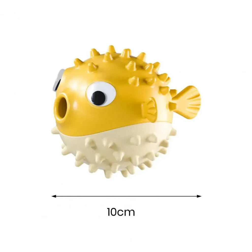 Yellow fish-shaped dog chew toy with textured surface for teeth cleaning