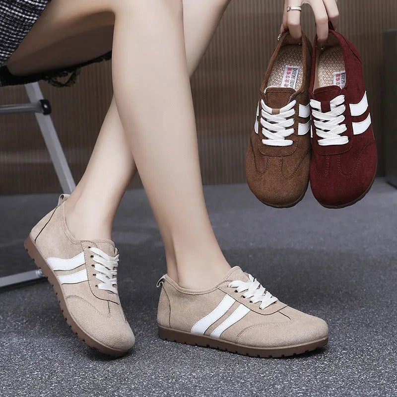 Women's vintage-style canvas sneakers with a soft rubber sole in dark red, maroon, and khaki colour options.