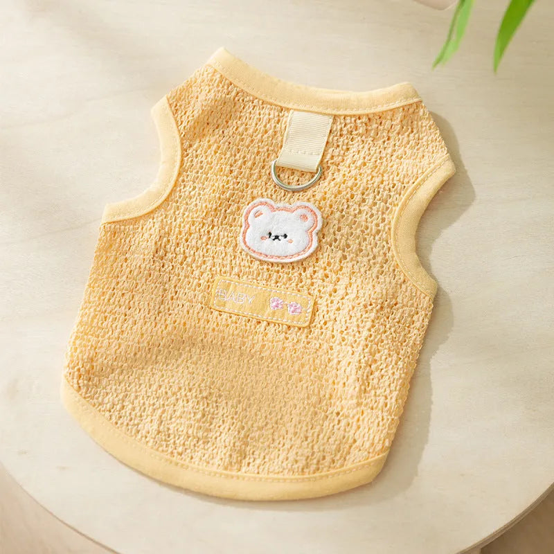 Green knitted cat top with hollowed-out design and a bear cartoon patch on the side