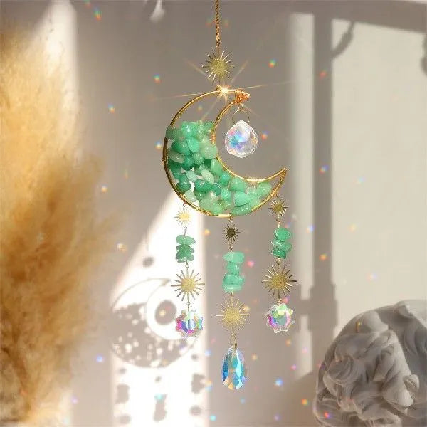 Moon-shaped K9 crystal car pendant hanging from a metal chain, available in blue, green, pink, purple, and white.