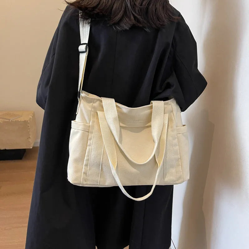 Large capacity shoulder canvas tote bag in solid colour with sandwich pocket and mobile phone compartment