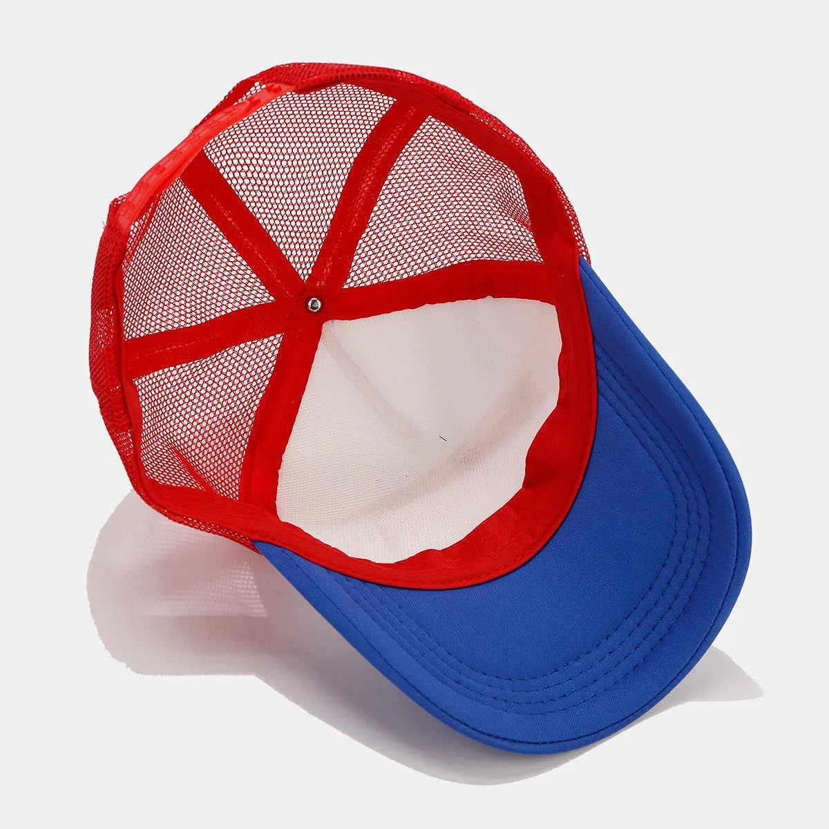 Red and blue mesh baseball cap with adjustable strap and dome crown design