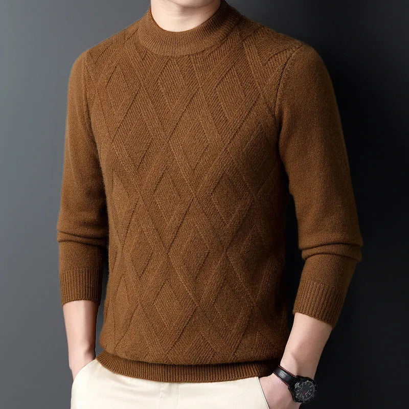 Man wearing a thick grey diamond jacquard knit pullover sweater.
