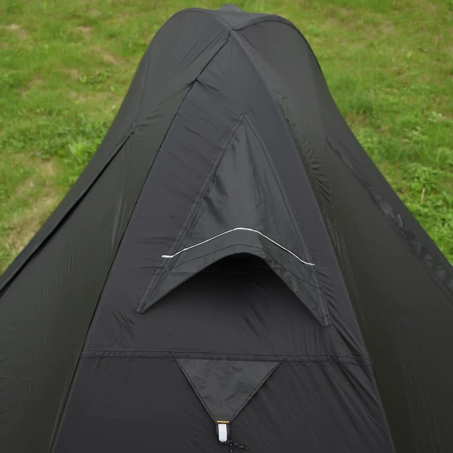 Single person tent with aluminum poles and silicon coated polyester outer layer in red black or orange