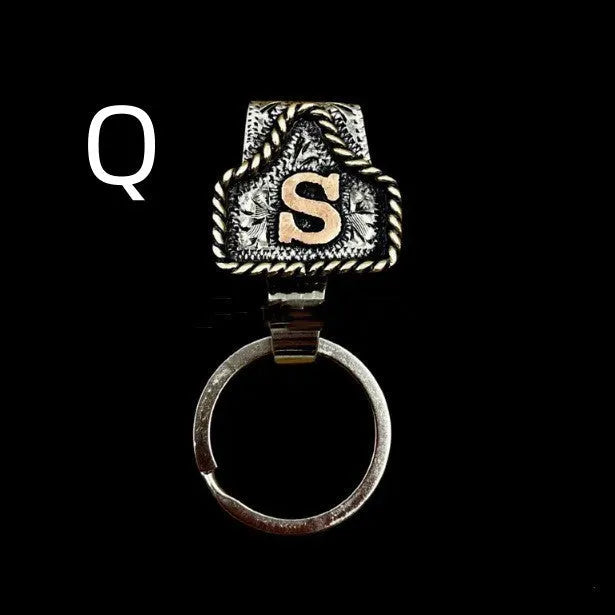 Handmade stainless steel cow tag belt key holder with engraved number plate on a split ring.