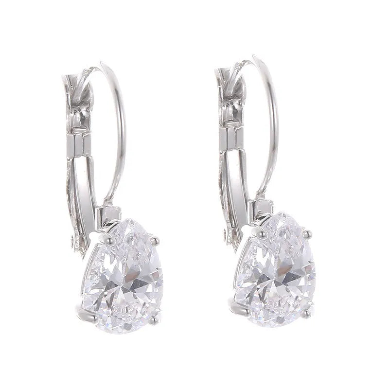 Gold and platinum coloured drop-shaped fashion earrings with metallic finish