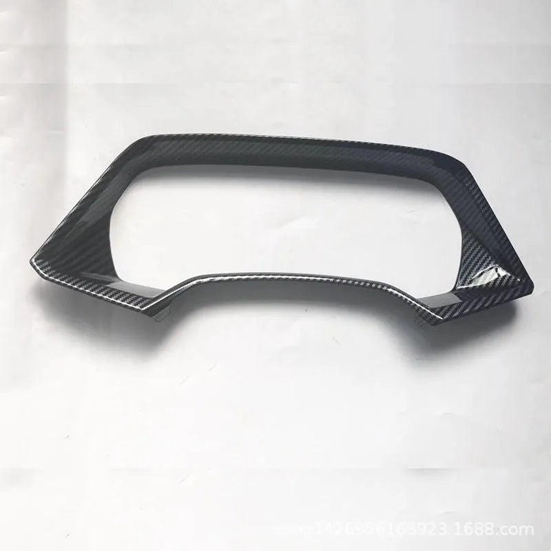 BMW X5 dashboard decorative frame in Peach Wood and Carbon Fibre finishes