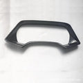 BMW X5 dashboard decorative frame in Peach Wood and Carbon Fibre finishes