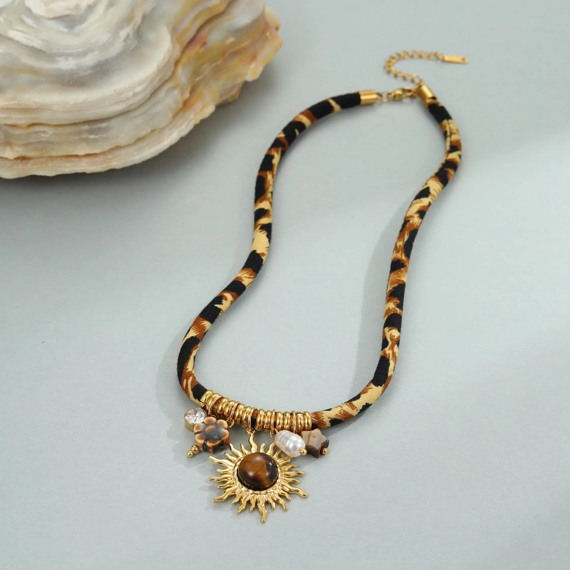 Leopard series stainless steel necklace with geometric pendant on regular chain, 18K electroplated finish