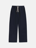 Men's fleece-lined sweatpants with elastic drawstring waist in loose fit design