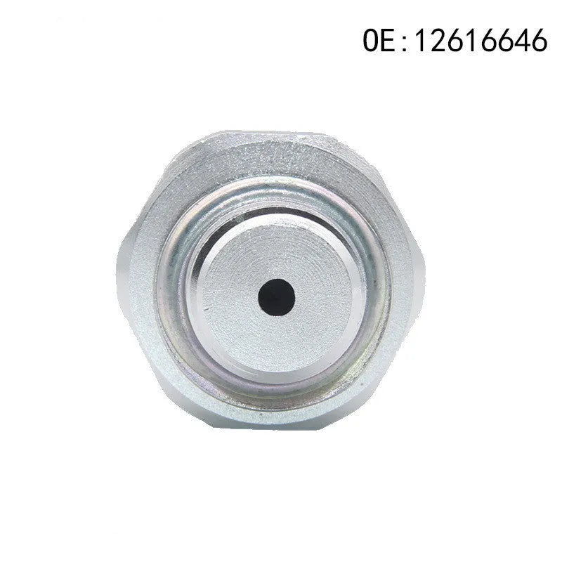 Silver metal General Motors fuel pressure sensor with part numbers 12616646 and 12677836.