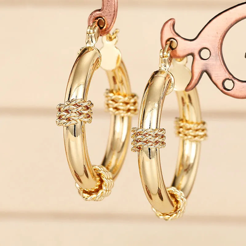 Geometric golden copper ear clip for women with ring and line design elements
