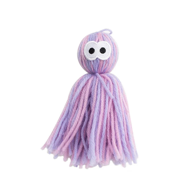 Bite-resistant wool ball cat toy with grinding teeth surfaces and hanging string in blue grey colour