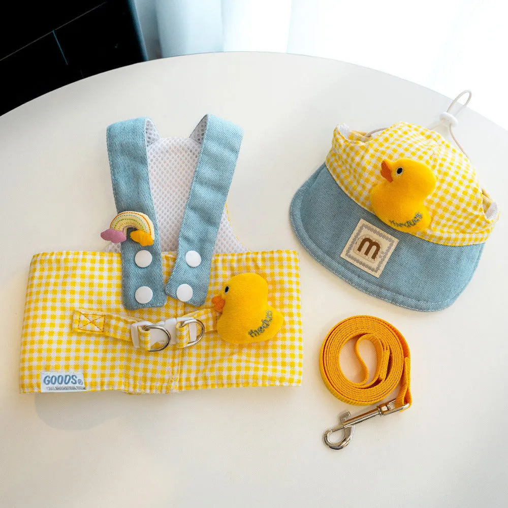 Three-piece pet clothing set with cute hat, dog harness, and wire rope leash in spring summer design