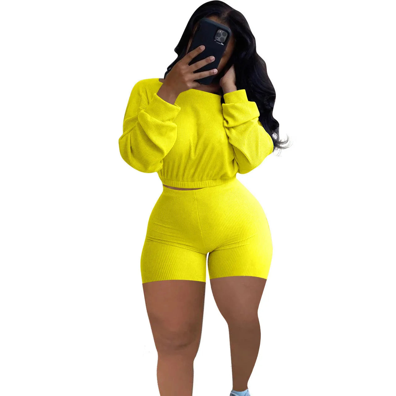 Sunken stripe solid colour off-the-shoulder long sleeve top and shorts two-piece set on a hanger.